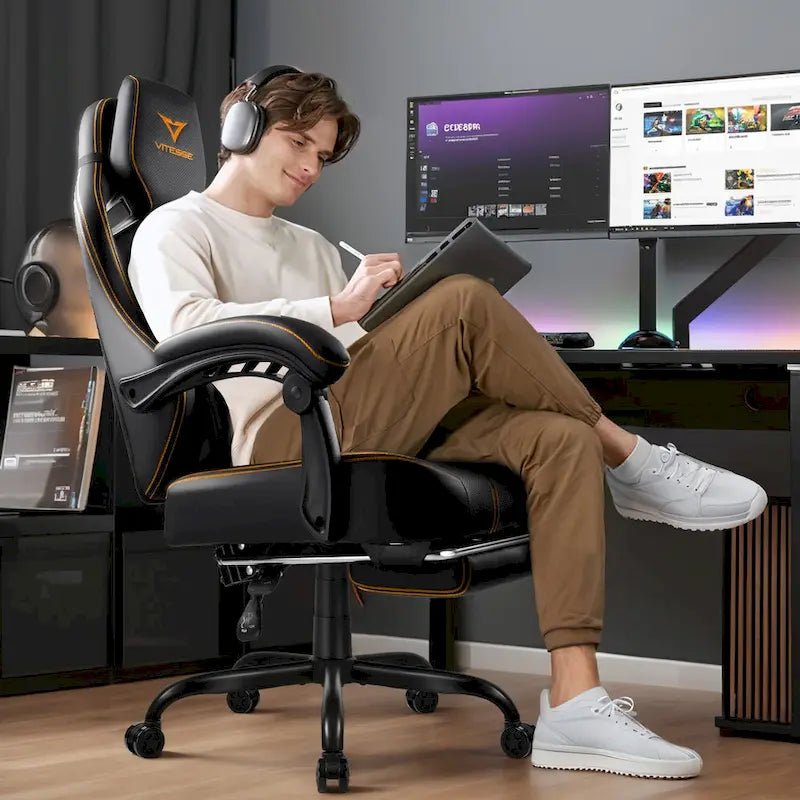 Black Ergonomic Gaming Chair with Footrest, Lumbar Support, and Adjustable Headrest