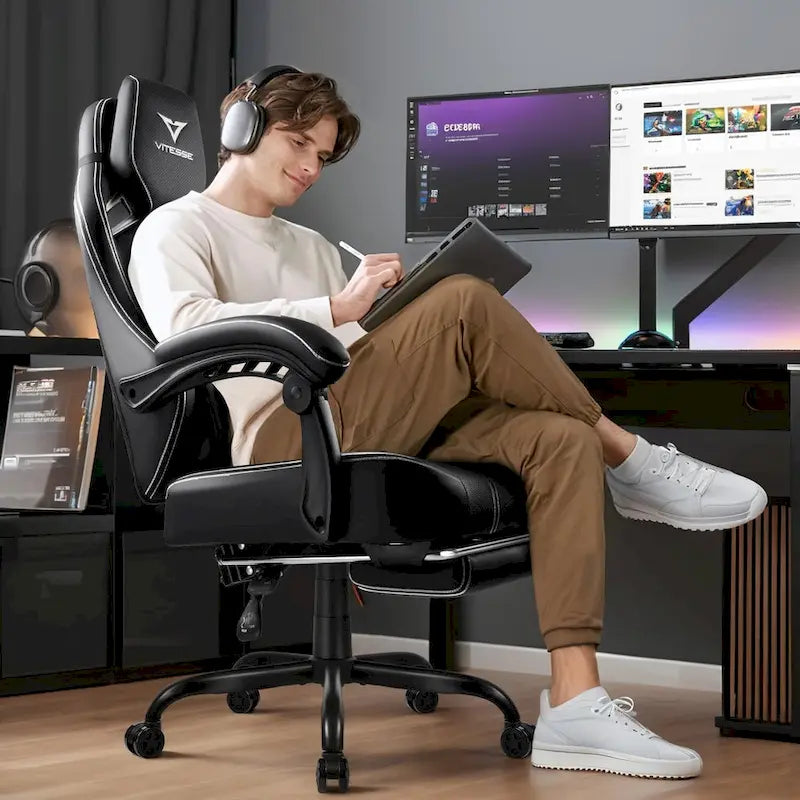 Black Ergonomic Gaming Chair with Footrest, Lumbar Support, and Adjustable Headrest
