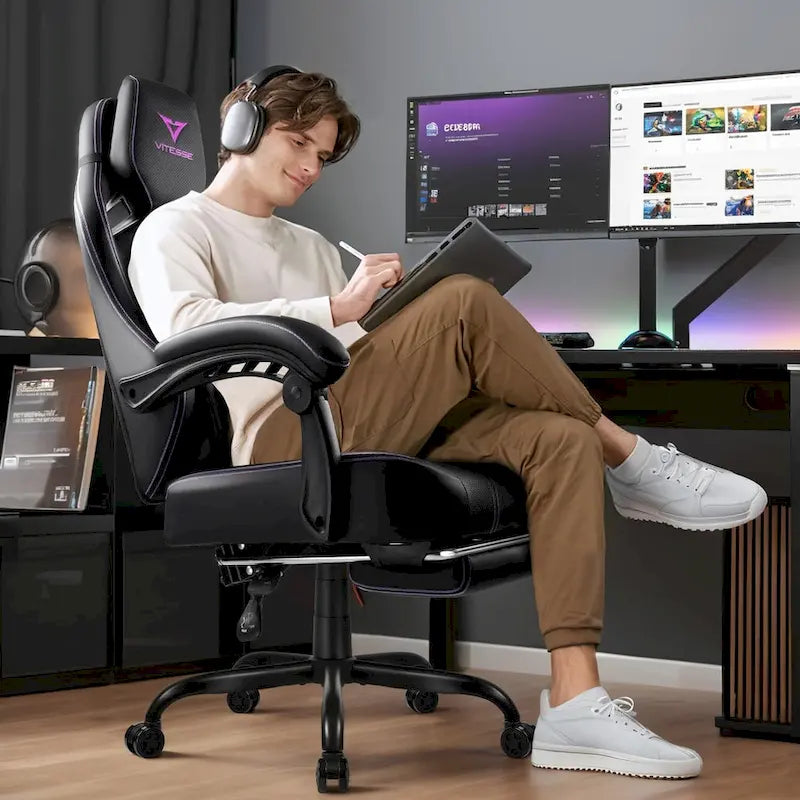 Black Ergonomic Gaming Chair with Footrest, Lumbar Support, and Adjustable Headrest