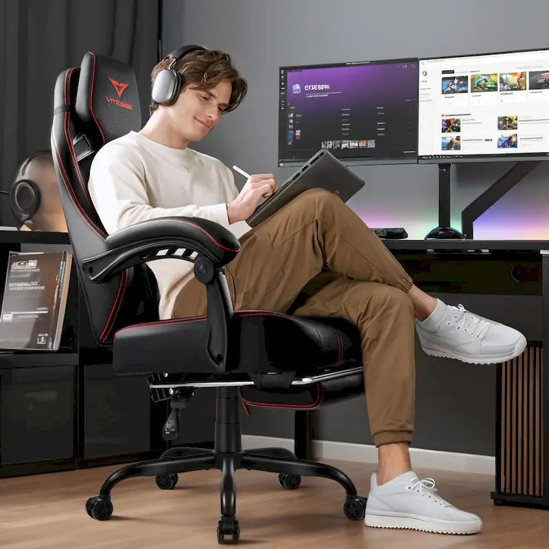 Black Ergonomic Gaming Chair with Footrest, Lumbar Support, and Adjustable Headrest